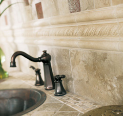 Close up of Kitchen Sink and Taps complete with innovative tile design