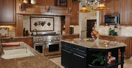 Kitchen with granite work surfaces and countertops