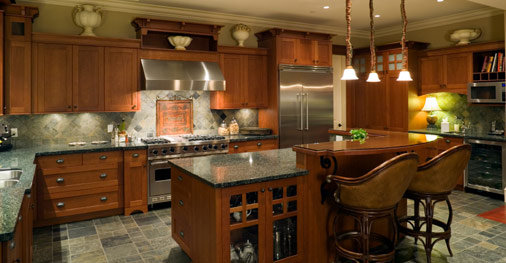 Dark Wood Kitchen with Stone Flooring