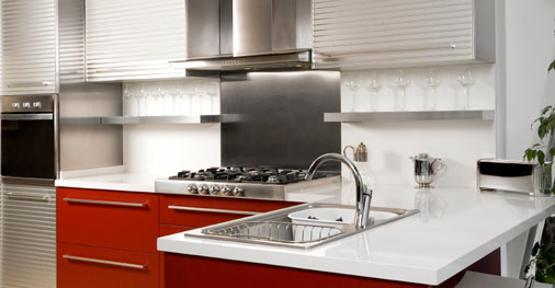 Modern Kitchen in Stainless Steel and Red Finishings