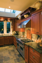 Kitchen with tile floor and Backsplash